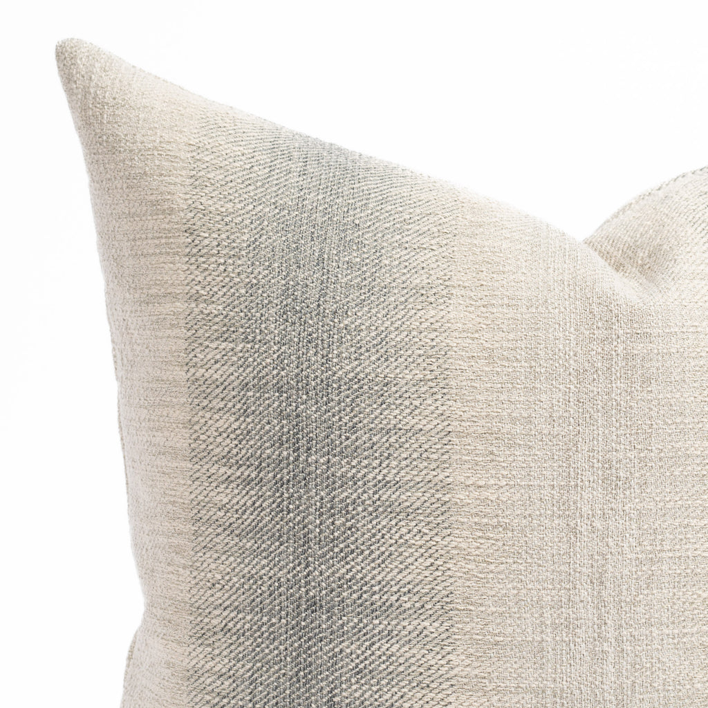 a blue and sandy gray ombré stripe throw pillow : close up view