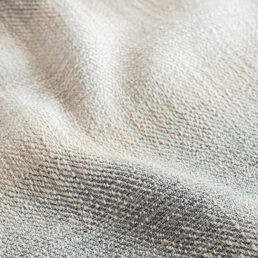 a denim blue and sandy grey ombre stripe home decor fabric
