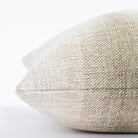 a mossy green and oatmeal ombré stripe throw pillow: close up side view