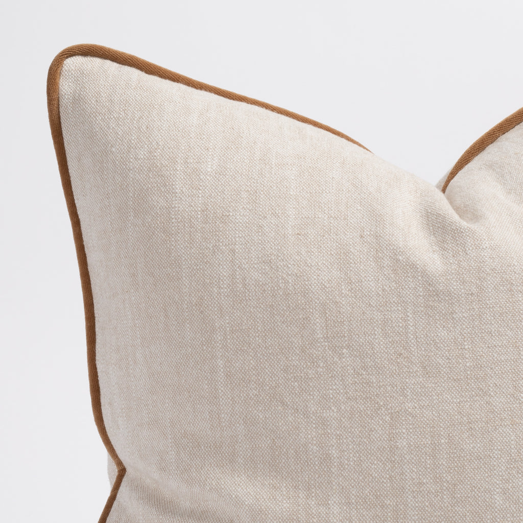 beige throw pillow with nutmeg brown velvet piping