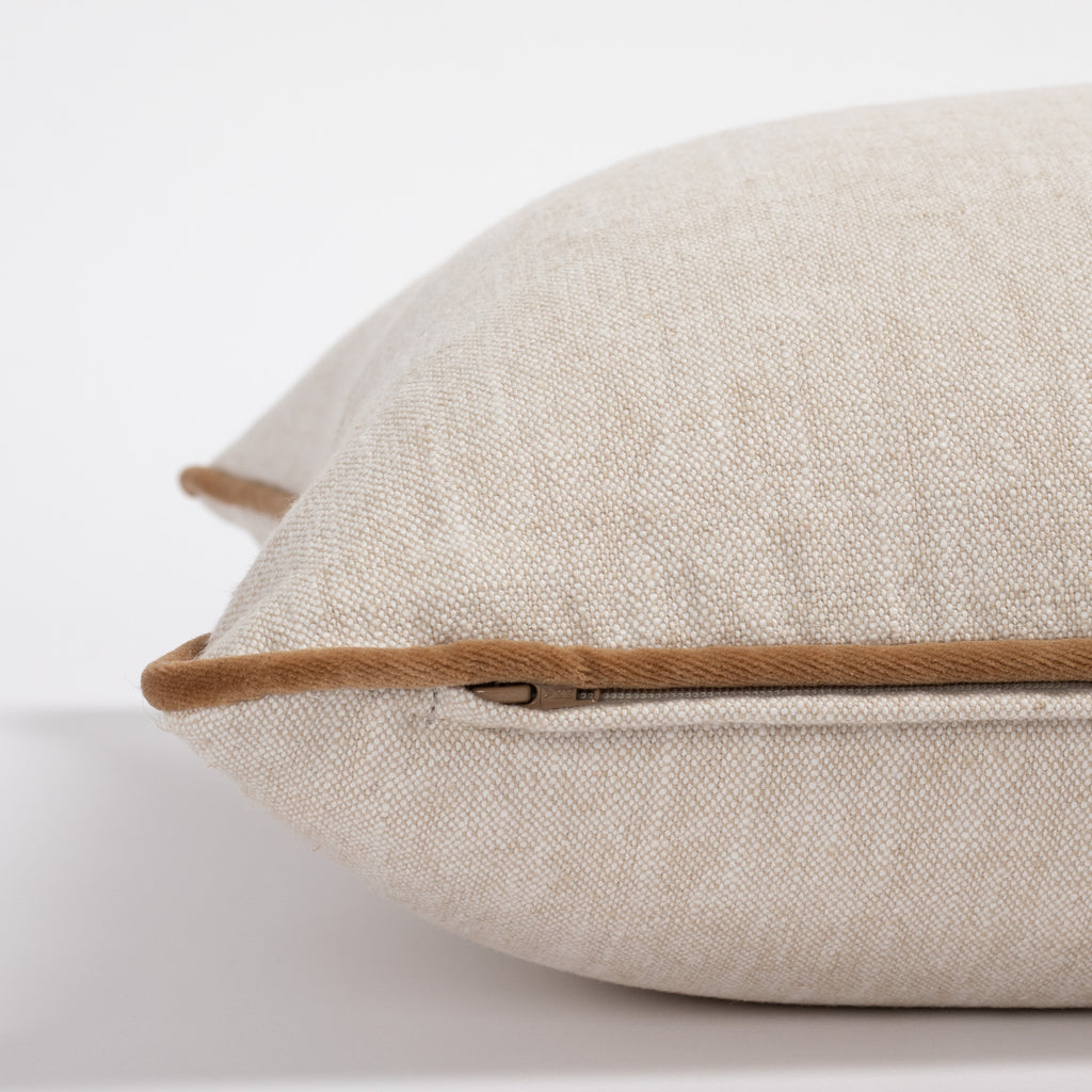 beige throw pillow with nutmeg brown velvet piping : zipper detail