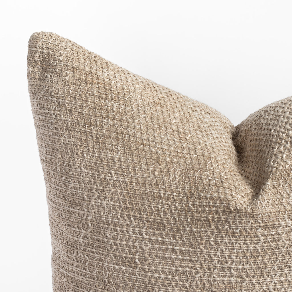 Taryn 22" x 22" Natural, a beige textured pillow : close up of corner