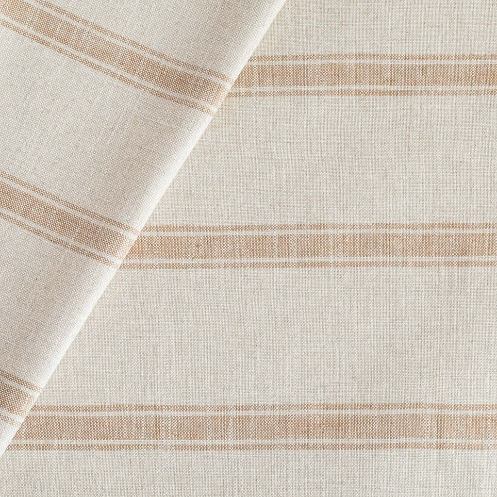 a faded rust and oatmeal cream striped upholstery fabric from Tonic Living 