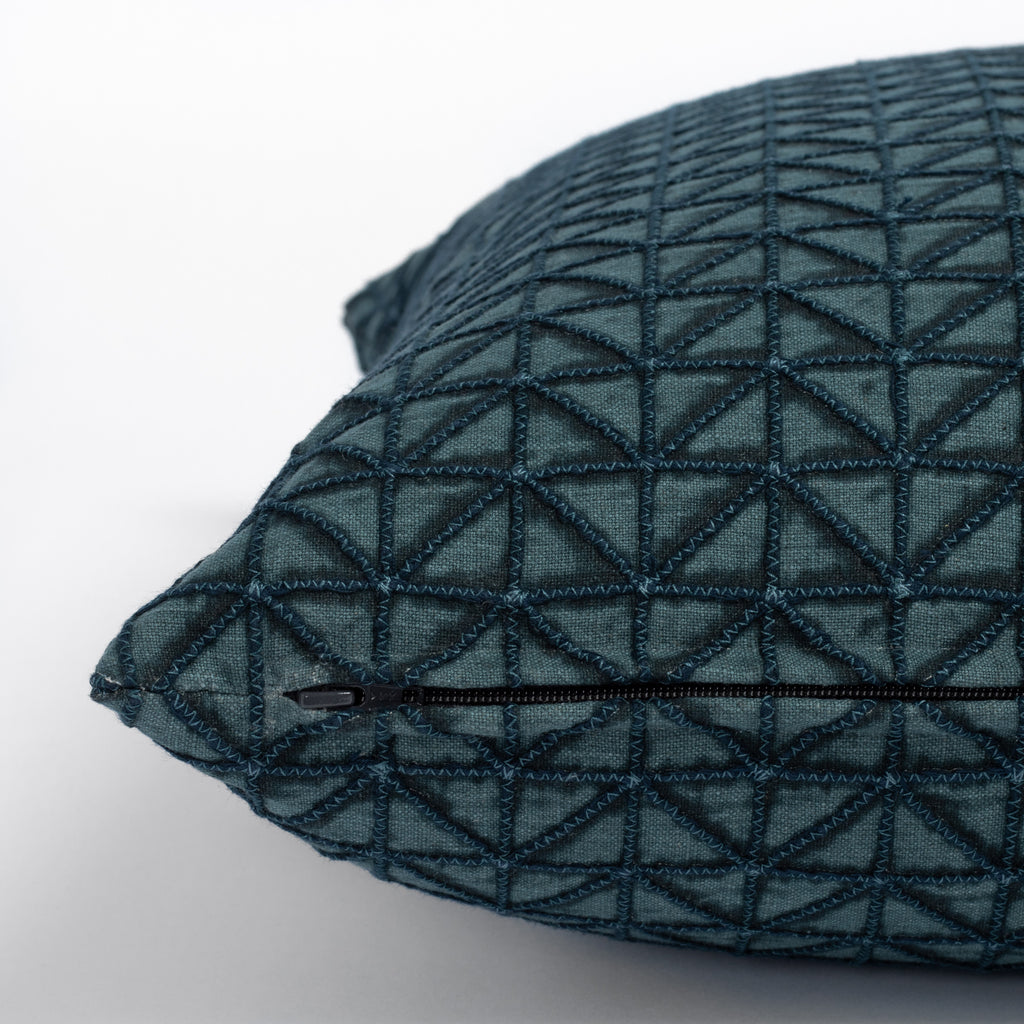 Torello Aegean Pillow, a teal blue geometric zig zag embroidered pattern pillow : close up zipper side