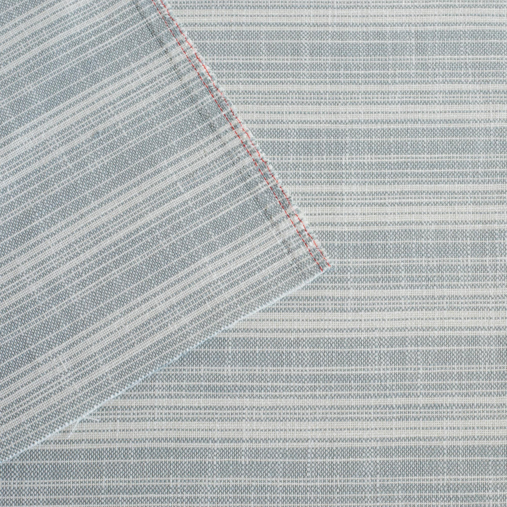Trouville Sky Blue and white variegated stripe patterned indoor outdoor fabric : view 3