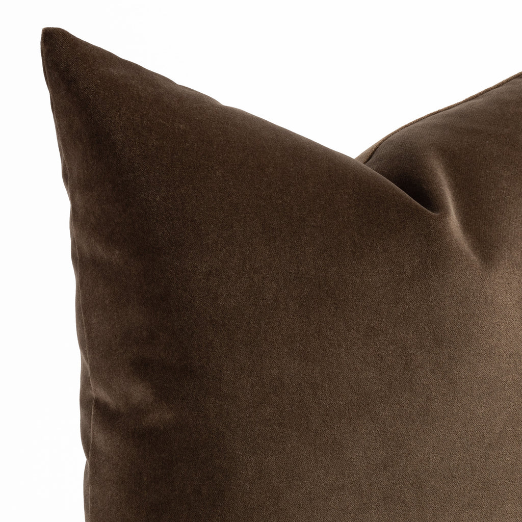 a deep brown velvet throw pillow 