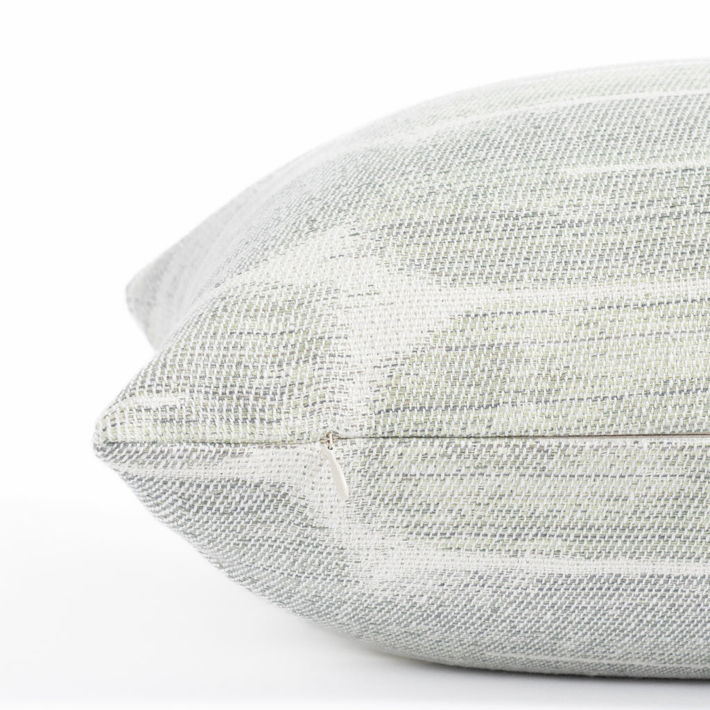 a watery blue green and white painterly swirl graphic pattern bolster pillow : close up invisible zipper view