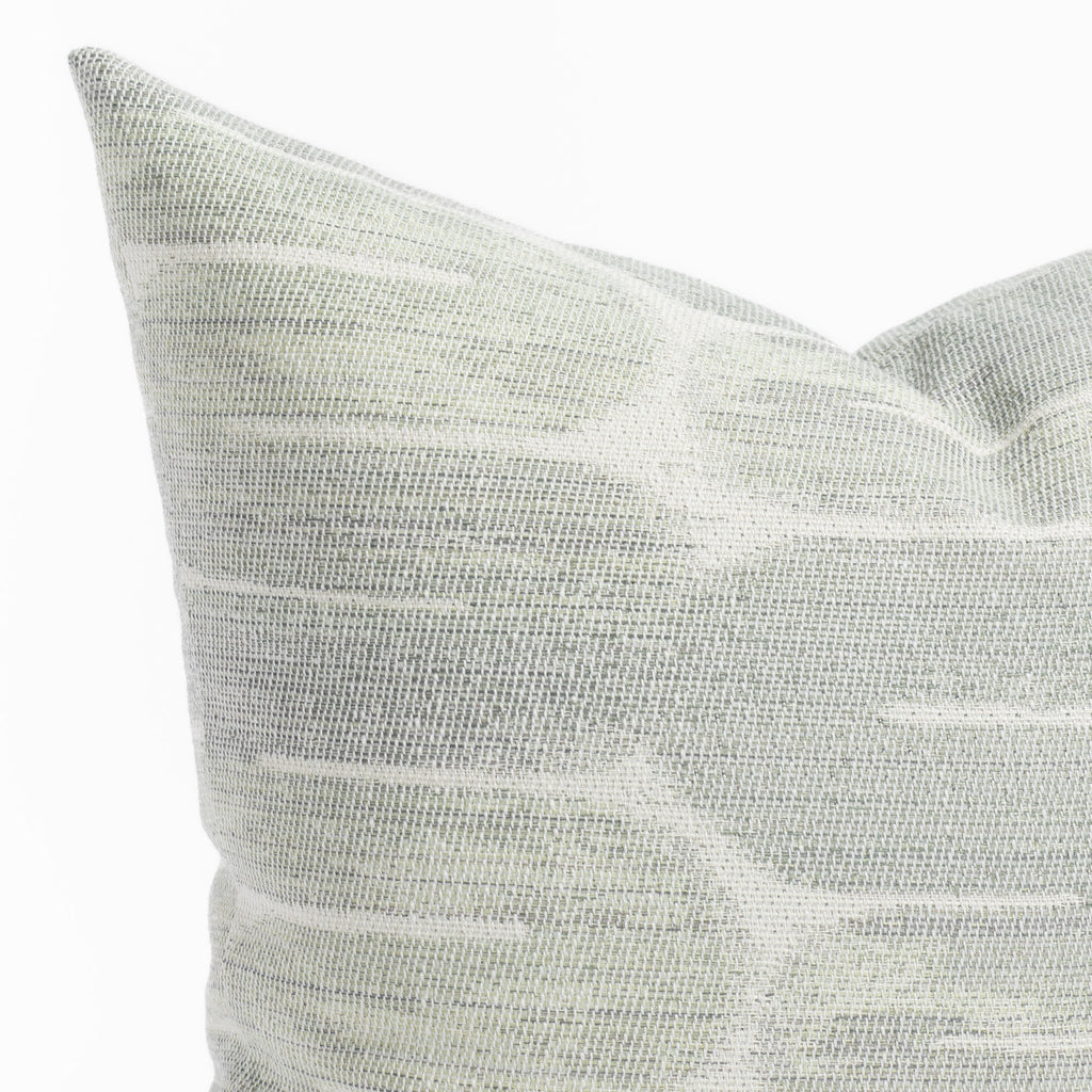 a watery blue-green graphic loopy swirl pattern throw pillow : close up view