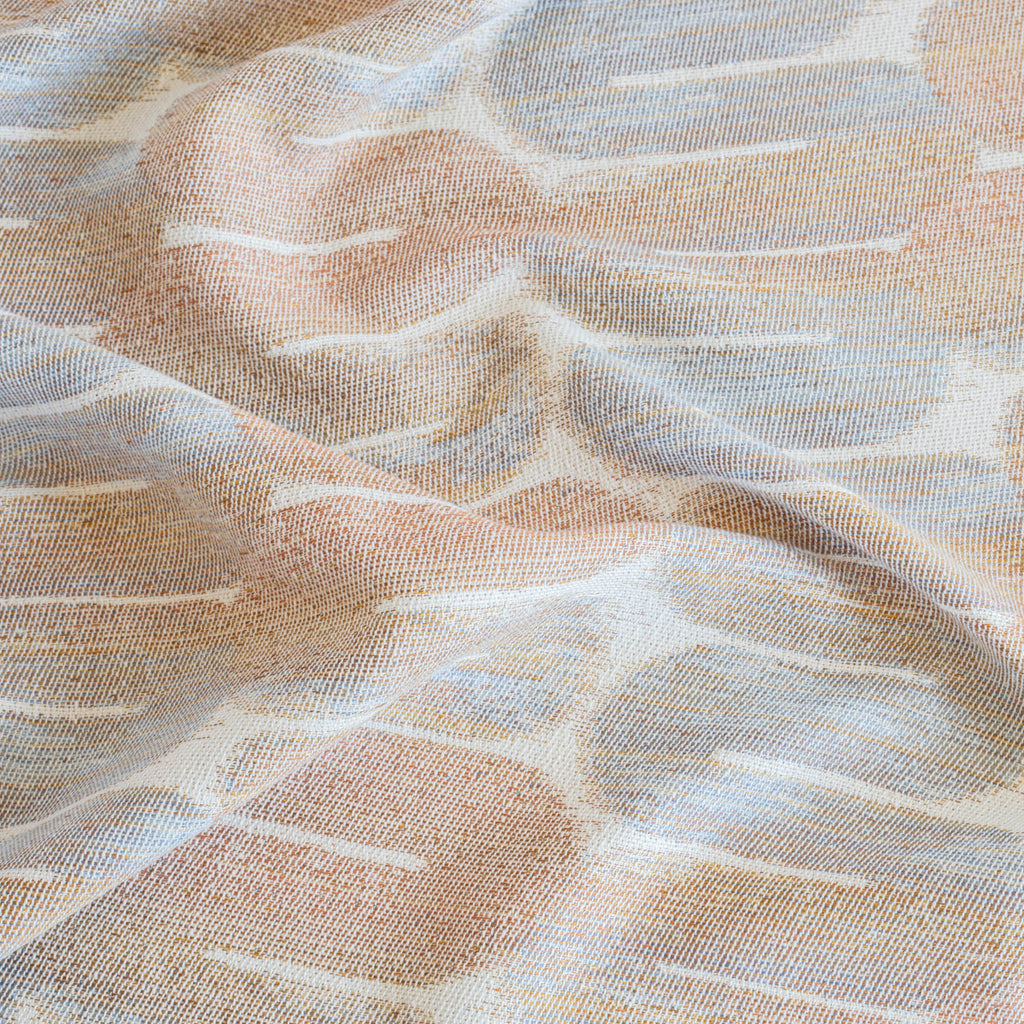 a terracotta orange, blue and cream painterly tubular patterned designer fabric