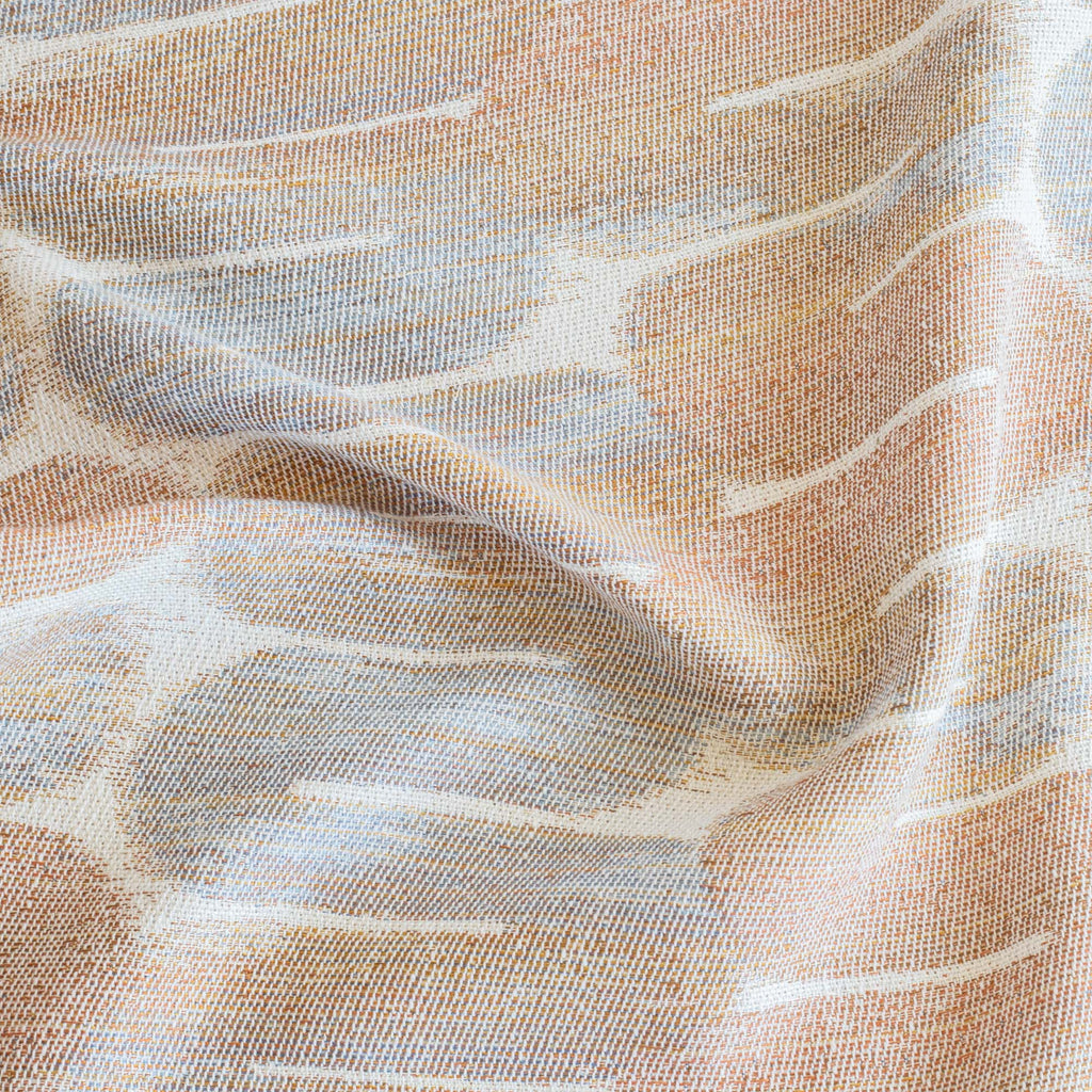 a terracotta orange, blue and cream painterly tubular patterned designer upholstery fabric